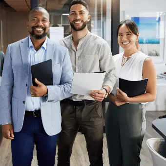Careers team photo showing colleagues working together at the company office -الوظائف
